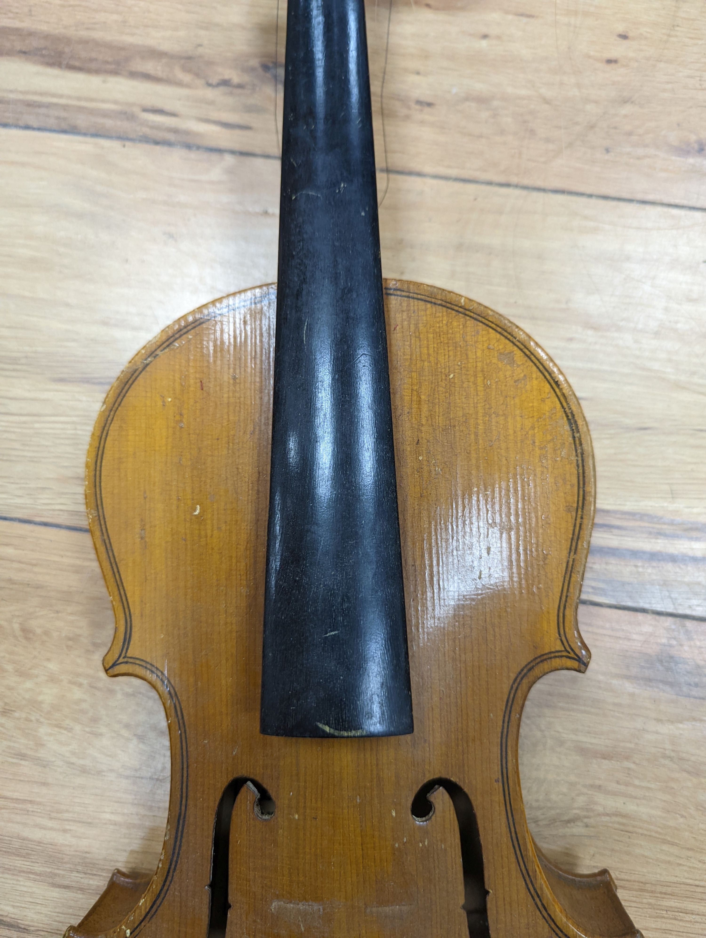 A violin and bow, various records etc